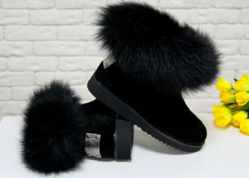Uggs with fur. Winter women’s uggs. Women’s boots of uggs. Fashionable ugg boots.